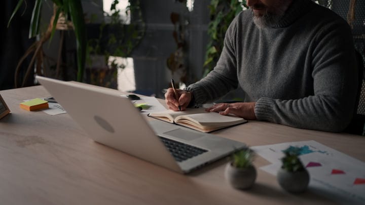 Focus And Flow: Businesswoman At Her Office Desk