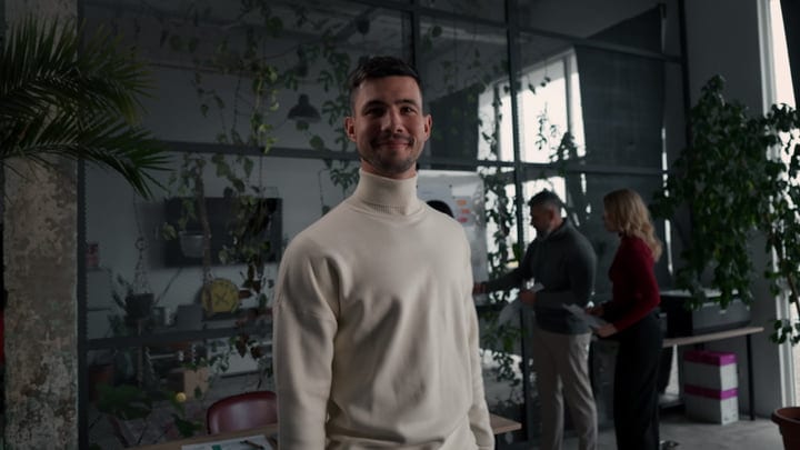 Confident Professional Embraces The Modern Eco-Friendly Office