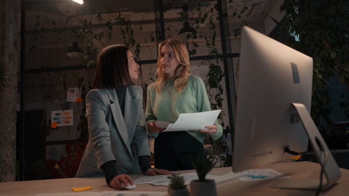 Collaborative Insights During a Modern Office Evening