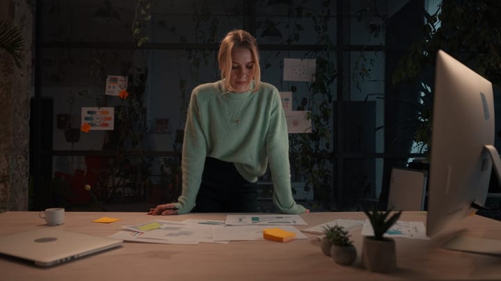 Thoughtful Businesswoman Strategizing Late In Her Office
