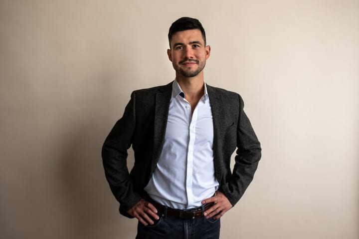 Confident Businessman in Modern Office Attire