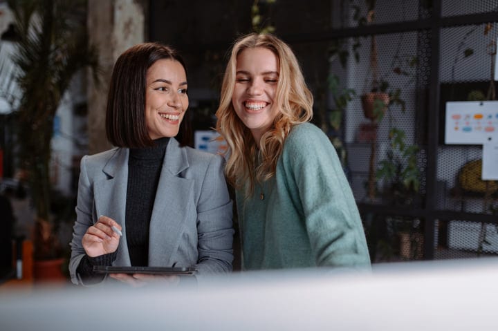 Collaboration Sparks Joy In Modern Office Setting
