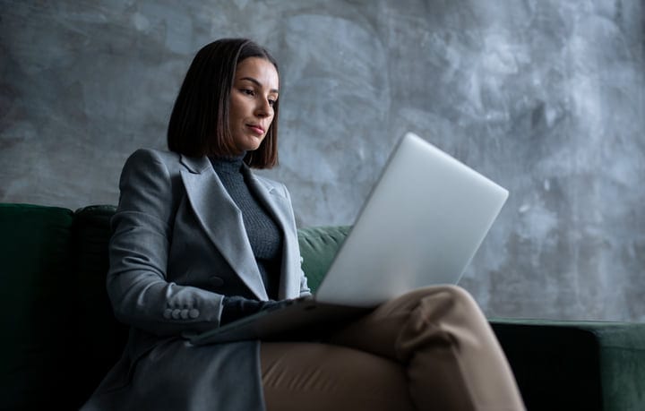 Focused Businesswoman Engages With Her Work In Modern Office