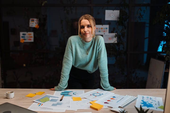 Confident Professional Engages With Her Creative Workspace