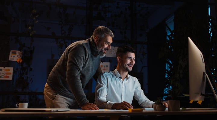 Collaborative Spirit Shines in Late Night Office Workspace