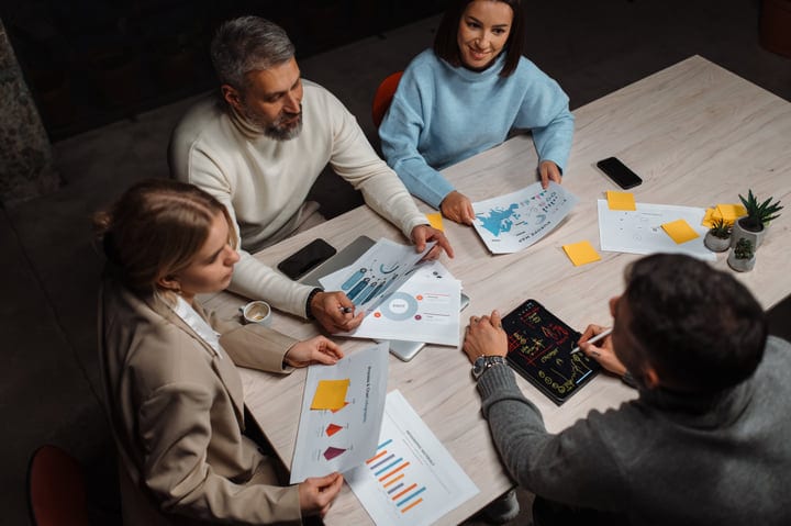 Collaborative Strategy Meeting With Diverse Business Team