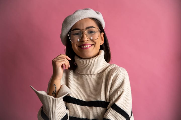 Confident Businesswoman Embraces Style With a Warm Smile