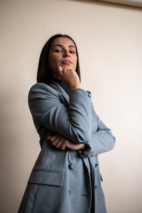 Confident Businesswoman Contemplating Ideas In The Office
