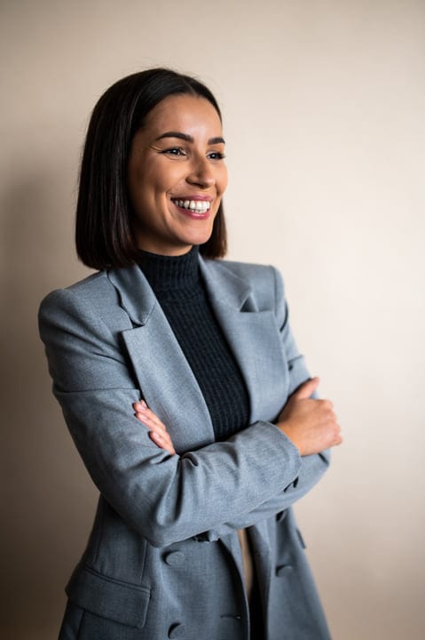 Confident Businesswoman Smiling Brightly In Her Office Space