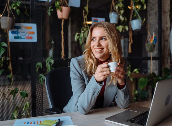 Bright Ideas Brew Amid Office Greenery And Coffee