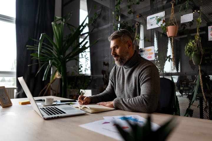 Focused Professional Working in Contemporary Office Setting
