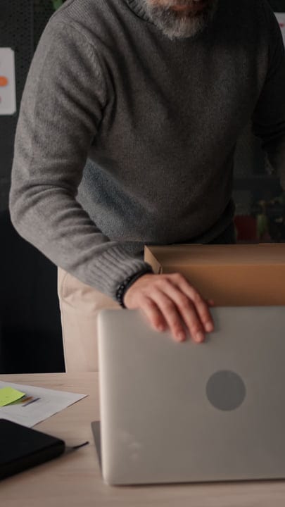Businesswoman Prepares Her Workspace In Modern Office Setting