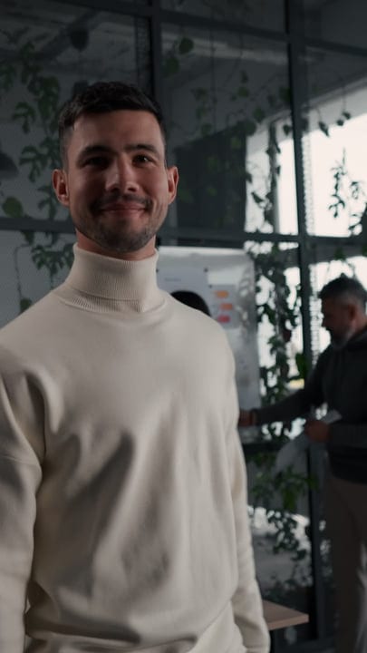 Smiling Professional in a Cozy Office Environment