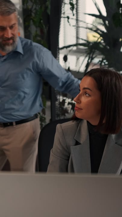 Focused Businesswoman Engages in Strategic Office Discussion