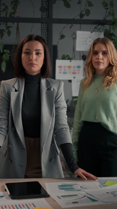 Confident Businesswomen Engaging in an Office Strategy Meeting