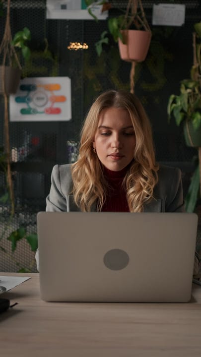 Focused Businesswoman Engaged in Her Work from Home Office