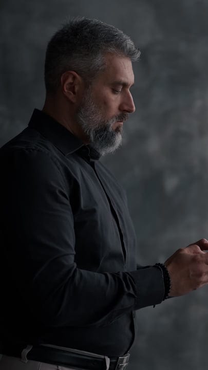 A Businessman Contemplates in a Modern Office Space