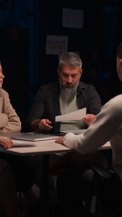 Business Team Collaborates Under Soft Evening Lighting