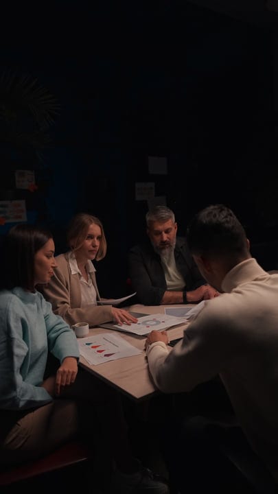 Team Collaboration In A Modern Office Setting
