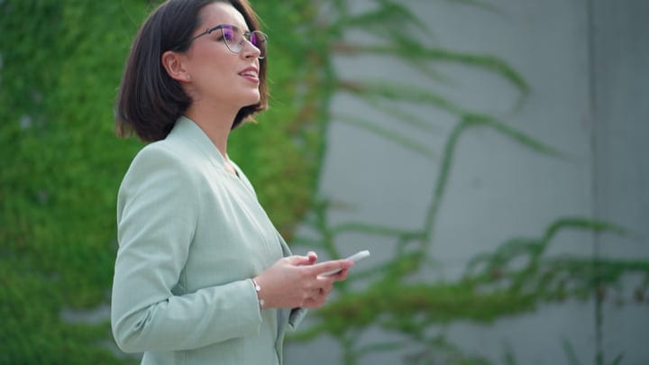 Confident Executive Embraces Vienna's Vibrant Outdoor Ambiance