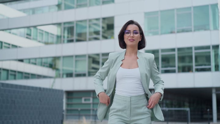 Confident Businesswoman Striding Through Vienna's Urban Landscape