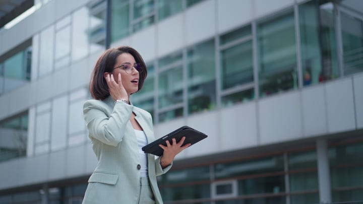 Confident Businesswoman Engages With Technology In Vienna's Heart