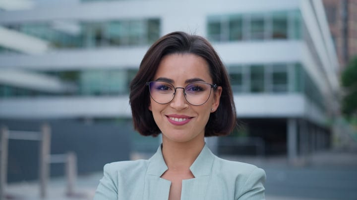 Confident Businesswoman Standing Proudly In Modern Vienna Setting