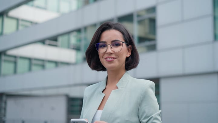 Confident Businesswoman Navigates Vienna's Modern Architecture