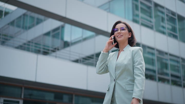 Confident Businesswoman Engaging in Conversation in Vienna