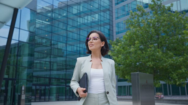 Confident Businesswoman Strolling Through Vienna's Urban Landscape