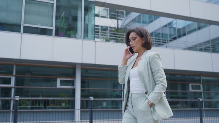 Confident Businesswoman Engages In A Call In Urban Vienna