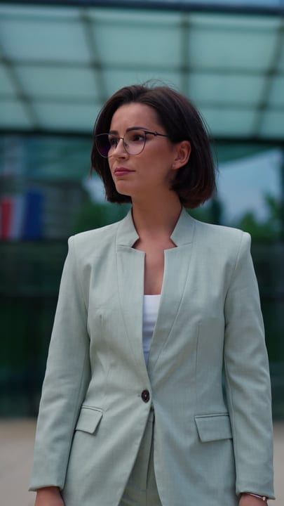 Confident Businesswoman Pondering In Vienna's Urban Landscape