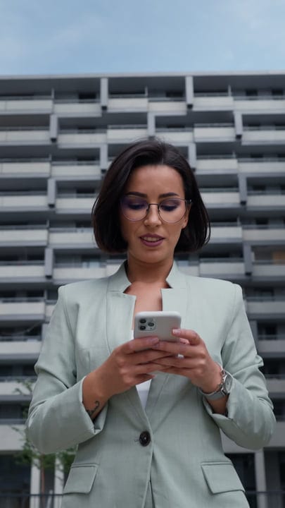 Confident Businesswoman Engages With Technology In Vienna