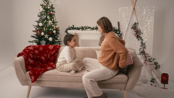 Mother And Son Share A Cozy Christmas Moment Together