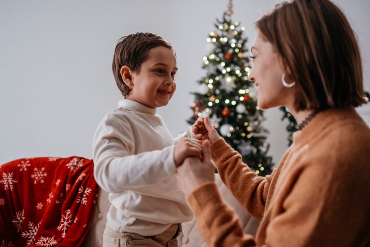Mother and Child Sharing Joyful Christmas Moments Together