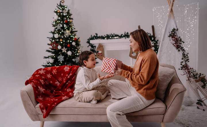 Mother and Child Share a Joyful Christmas Moment at Home