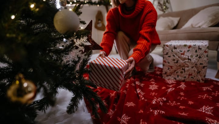 Unwrapping Joy Under The Glittering Tree Lights