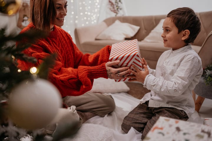 Mother and Child Share a Joyful Christmas Moment