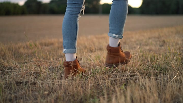 A Farmer's Boots Tread Lightly On Autumn Fields