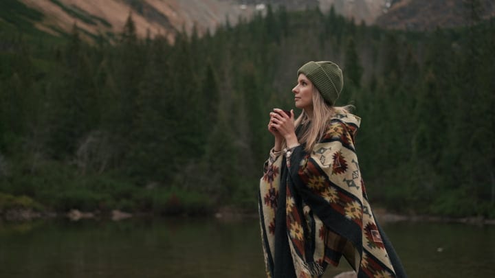 Contemplative Moment Wrapped In Nature's Warm Embrace