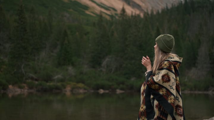 Wrapped In Nature's Embrace By A Tranquil Lake