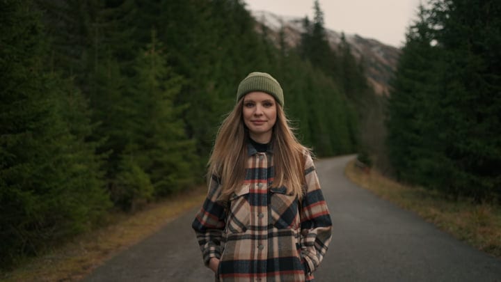 A Lone Explorer Embraces the Tranquil Wilderness Path