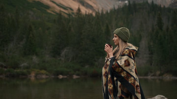 Solitude in Nature with a Warm Drink in Hand