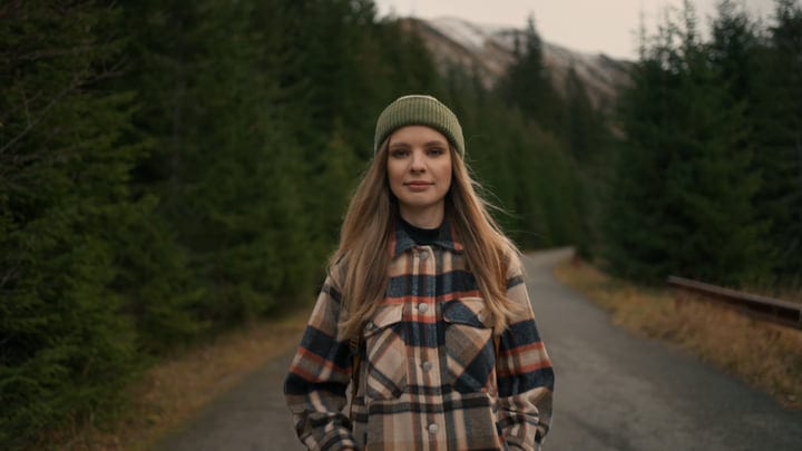 Young Hiker Embraces the Tranquility of Nature's Path