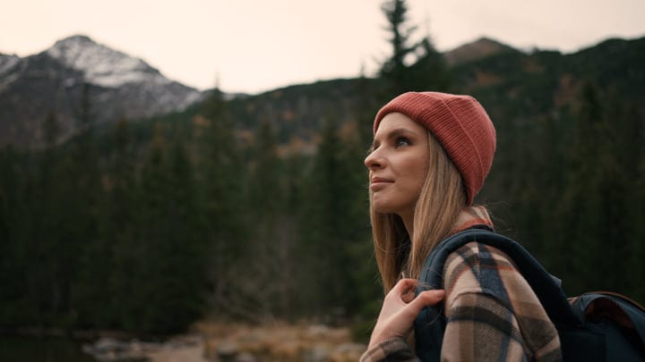 Contemplative Hiker Embraces the Serenity of the Wilderness