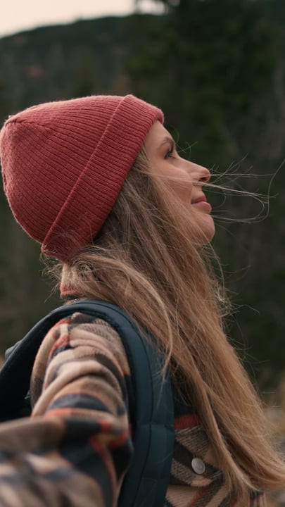 Joyful Hiker Embraces the Tranquility of Nature