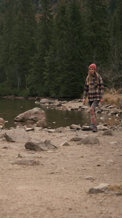 Adventurous Steps Along a Serene Mountain Stream