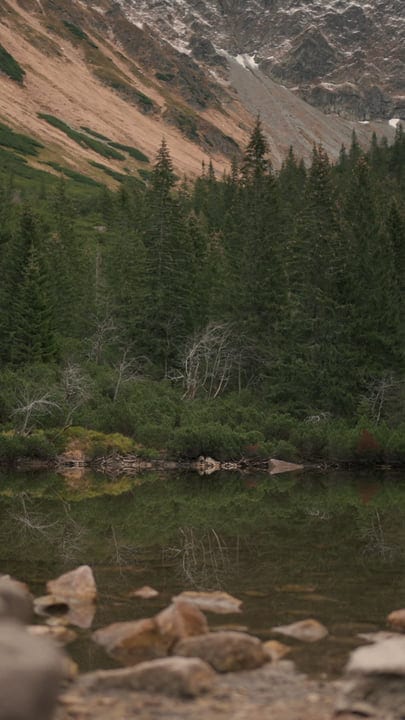 A Tranquil Lake Reflects Autumn's Quiet Majesty