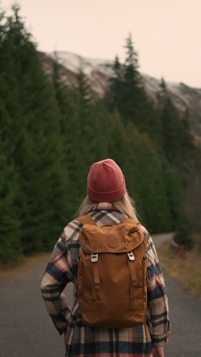 Embracing Adventure In A Cozy Flannel And Knit Hat