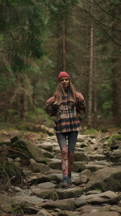 A Female Hiker Embraces Serenity In The Wilderness